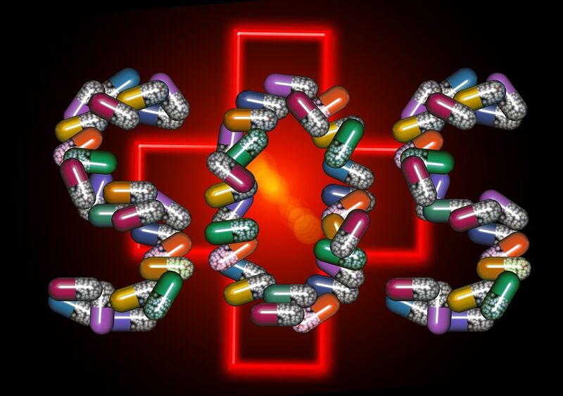 Datei:Wort SOS mit Tabletten.jpg